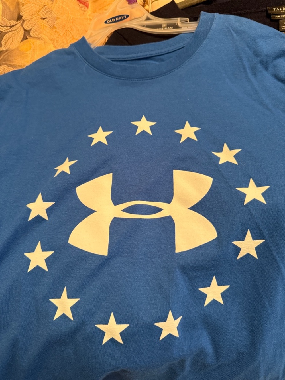 Under Armour Blue Short Sleeve Tee with Star Ring Logo and flag on sleeve